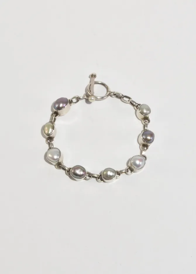 pearl-link-bracelet-LXiIcQzu-0.webp Pearl Link Bracelet